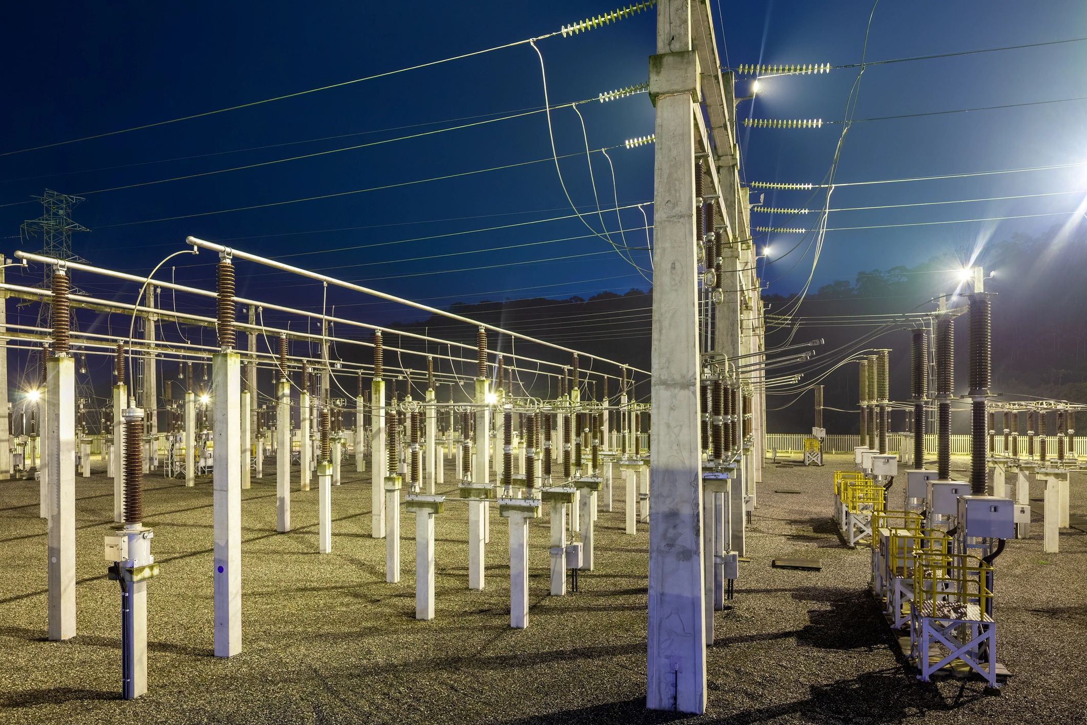 Electrical substation at night for utility power applications